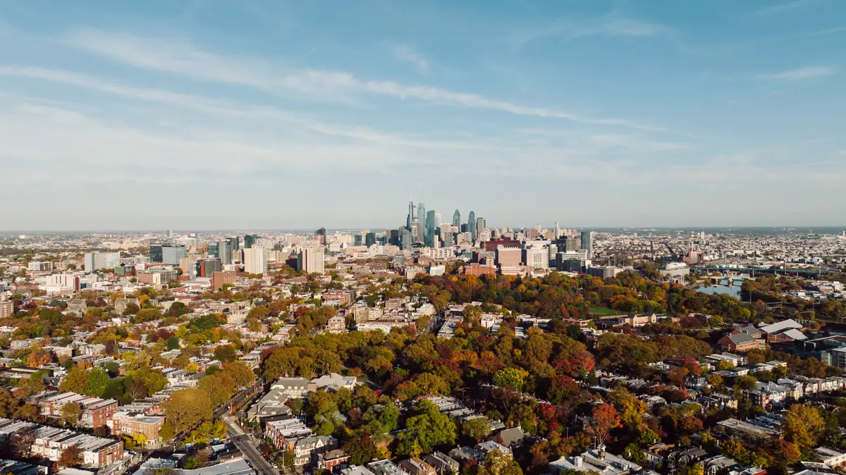 Philadelphia skyline above autumn trees
