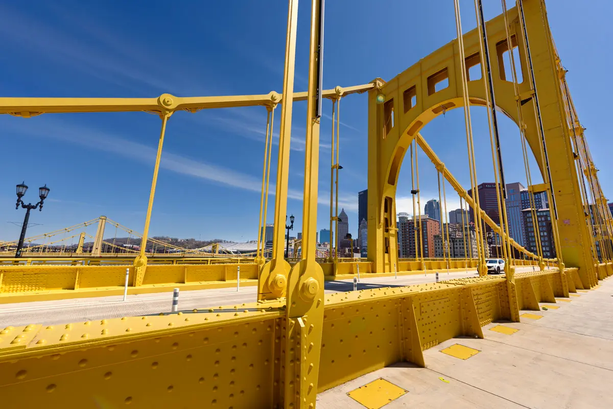 Yellow bridge into downtown Pittsburgh on a sunny day